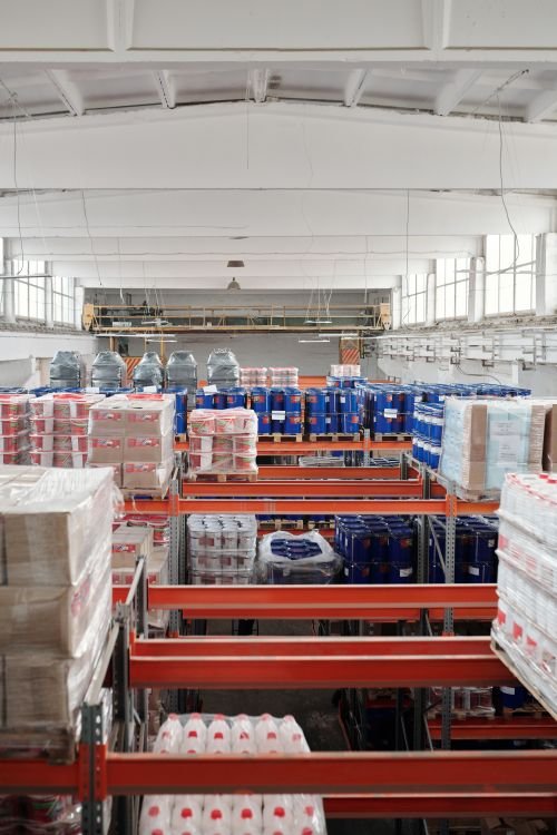 Warehouse shelves stocked with organized inventory ready for tracking